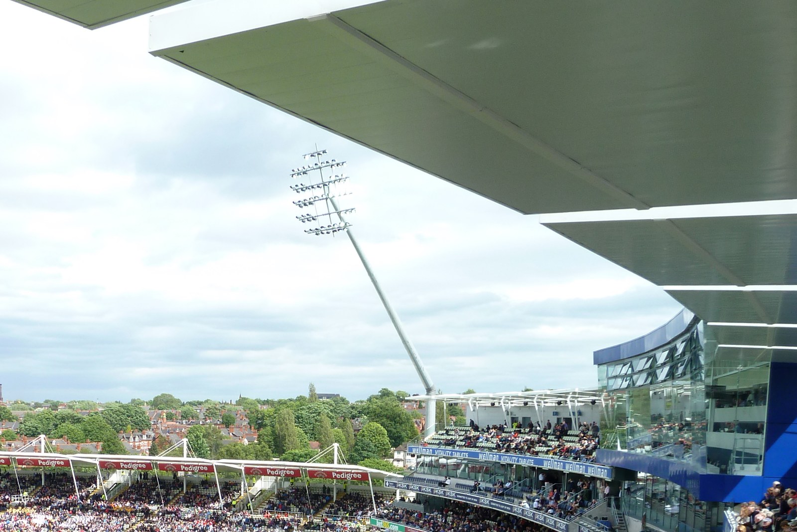 Edgbaston’s rebuilt South Stand with its glazed facade and roof, beside the Eric Hollies Stand in June 2012
