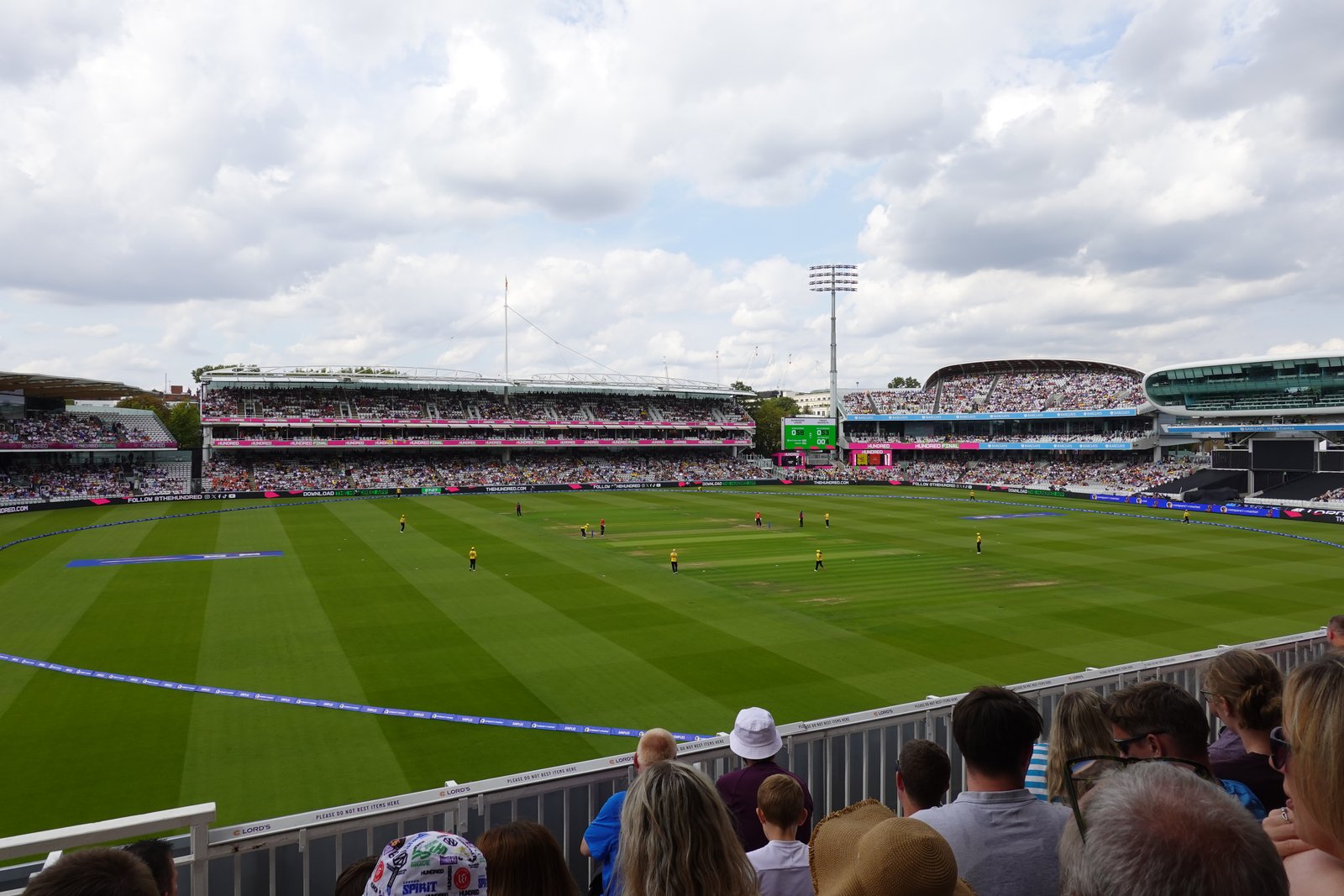Cricket at Lord’s in 2026, looking across the outfield towards the Grand and Compton stands and Media Centre