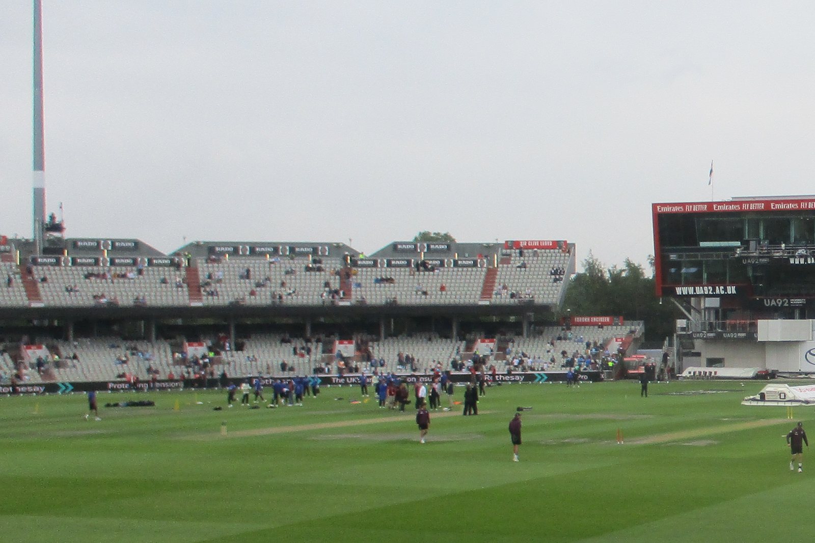 Stand B’s open upper tier and sheltered lower rear rows, with the Media Centre to the right, at Old Trafford in July 2025